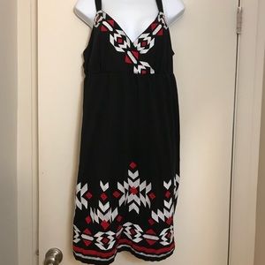 Adorable dress! Fits like 16/18